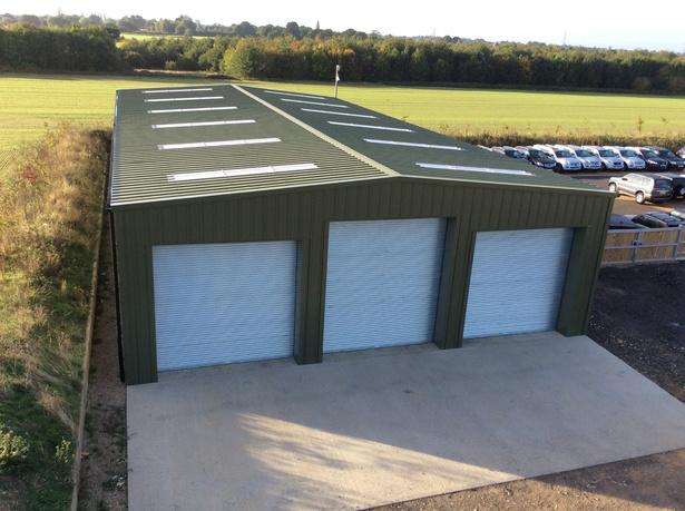Multi-bay steel building with roller doors